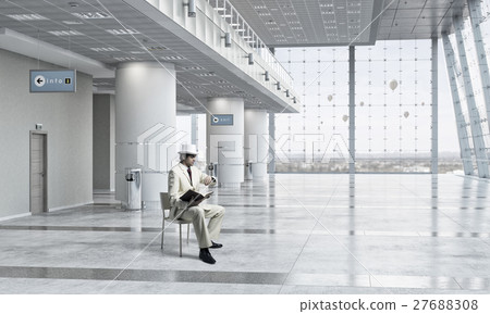 Elegant businessman read old book 27688308