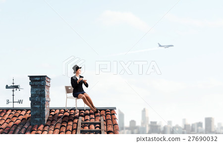 Elegant businesswoman in cylinder hat 27690032