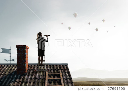 Woman making announcement in megaphone Woman making announcement in megaphone 27691300