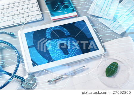 Top view of doctor workplace with tablet pc and medicine tools on wooden table 27692800