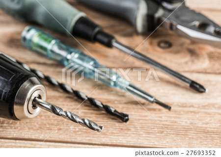 Carpentry tools on wooden surface Carpentry tools on wooden surface 27693352