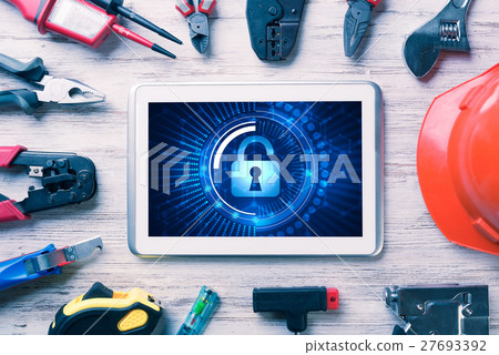 Web security and technology concept with tablet pc on wooden table Web security and technology concept with tablet pc on wooden table 27693392