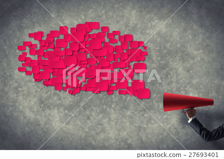 Hand of businesswoman holding red paper trumpet and speech cloud Hand of businesswoman holding red paper trumpet and speech cloud 27693401