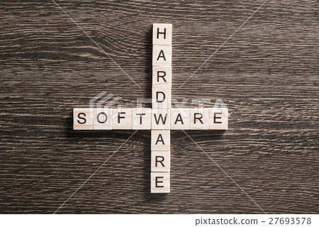 Conceptual media keywords on table with elements of game making crossword 27693578