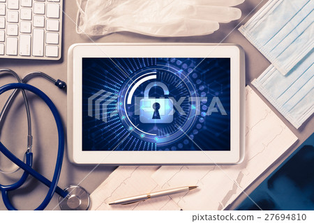 Web security and technology concept with tablet pc on table Web security and technology concept with tablet pc on table 27694810