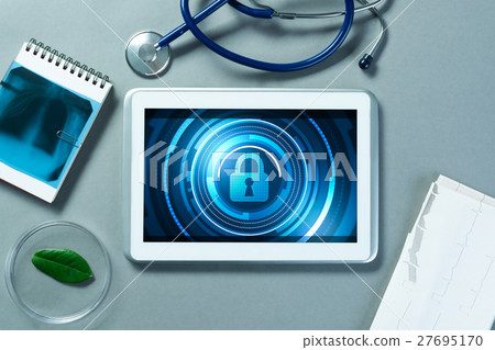 Web security and technology concept with tablet pc on table Web security and technology concept with tablet pc on table 27695170