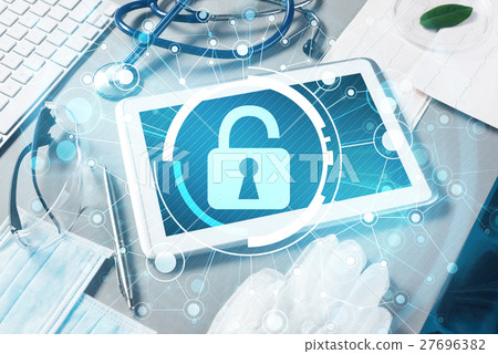 Top view of doctor workplace with tablet pc and medicine tools on wooden table Top view of doctor workplace with tablet pc and medicine tools on wooden table 27696382