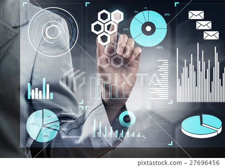 Hand of businesswoman pressing with finger icon on media screen Hand of businesswoman pressing with finger icon on media screen 27696456