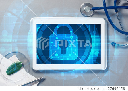 Top view of doctor workplace with tablet pc and medicine tools on wooden table Top view of doctor workplace with tablet pc and medicine tools on wooden table 27696458