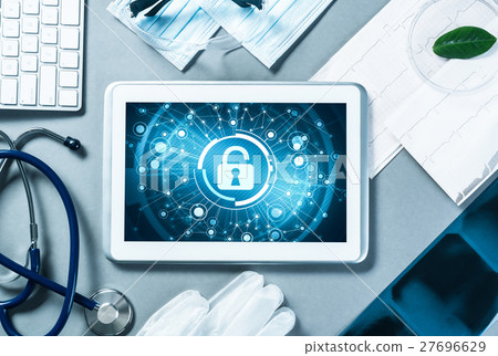 Web security and technology concept with tablet pc on table 27696629