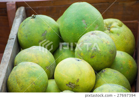 pile of fresh grapefruit. pile of fresh grapefruit. 27697394