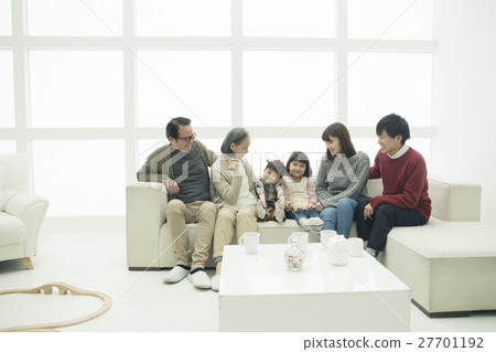 Three generation family sitting on the sofa Three generation family sitting on the sofa 27701192
