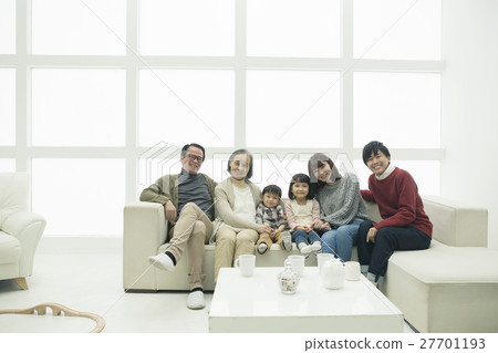 Three generation family sitting on the sofa 27701193