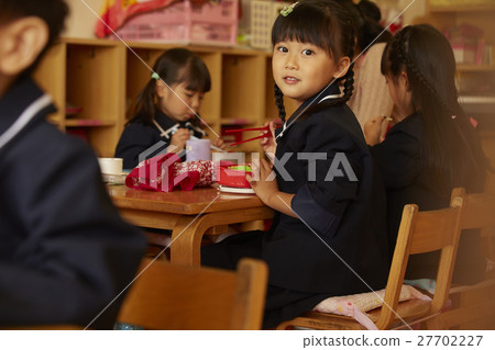Children at lunchtime Children at lunchtime 27702227