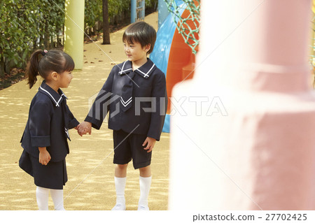 Boys and girls holding hands 27702425