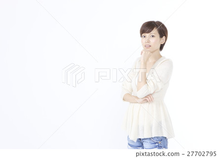 A young woman in a pose of thought 27702795