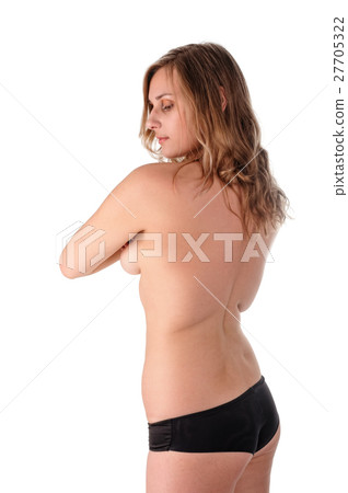 topless woman body covers her breasts. Back view topless woman body covers her breasts. Back view 27705322
