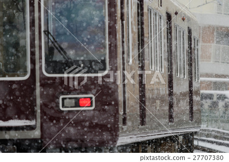 Hankyu train running in the snow Hankyu train running in the snow 27707380
