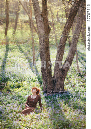 Beautiful young woman in the forest 27707546