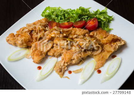 Pork steaks served with vegetables. Pork steaks served with vegetables. 27709148