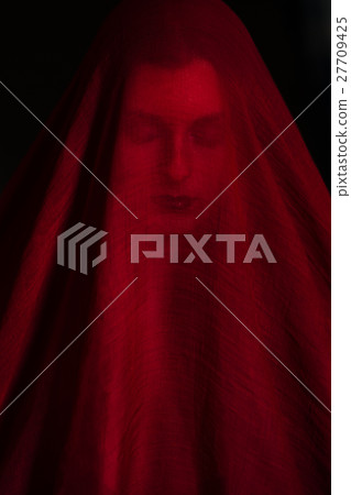 Girl posing with red fabric 27709425