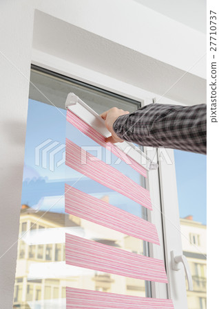Installing fabric roller blinds. Installing fabric roller blinds. 27710737