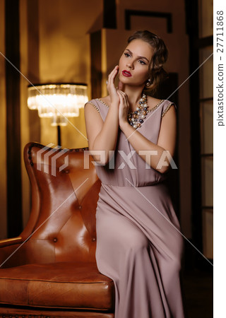 Young woman in long silk dress Young woman in long silk dress 27711868