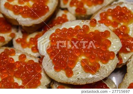 Sandwiches with red caviar 27715697