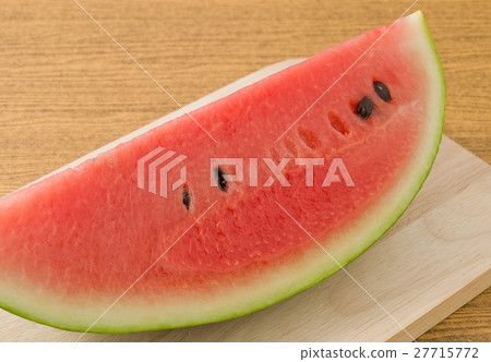 Red Ripe Watermelon on A Wooden Board Red Ripe Watermelon on A Wooden Board 27715772