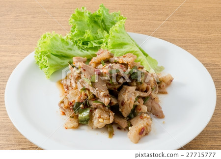 Plate of Spicy Grilled Beef Salad on Wooden Table Plate of Spicy Grilled Beef Salad on Wooden Table 27715777