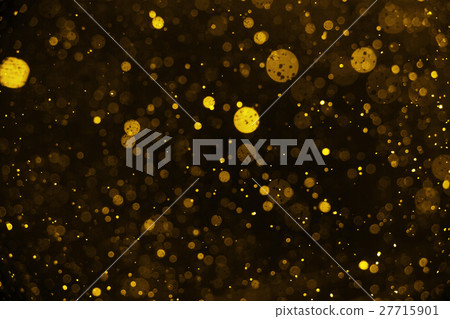 Falling golden snow on black background. Falling golden snow on black background. 27715901