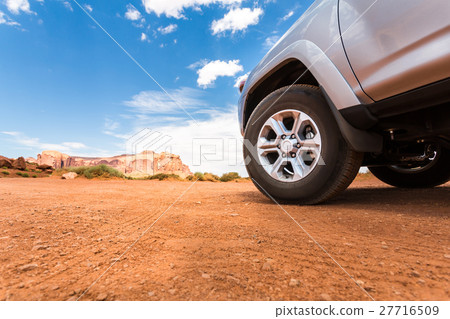 Truck in desert with mountains on the background. Truck in desert with mountains on the background. 27716509
