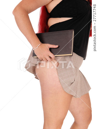 Woman lifting skirt. 27717748