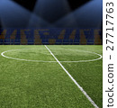 Soccer ball on the green field 27717763