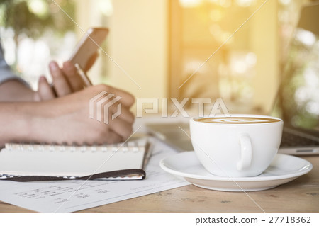 Business man using smartphone and laptop  27718362