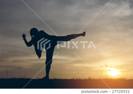 Silhouette woman lifestyle relax and her kick  27720552