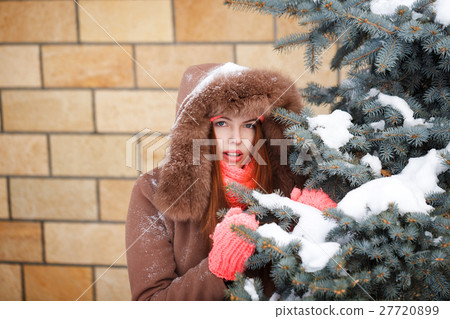 Girl teenager in winter. 27720899
