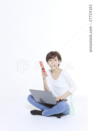 A laptop computer and a young lady 27724161