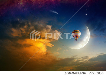Hot air balloon in glowing sky with rising moon 27727838
