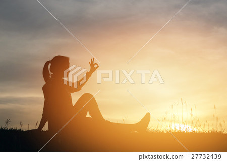 Silhouette woman lifestyle relax at sunset Silhouette woman lifestyle relax at sunset 27732439
