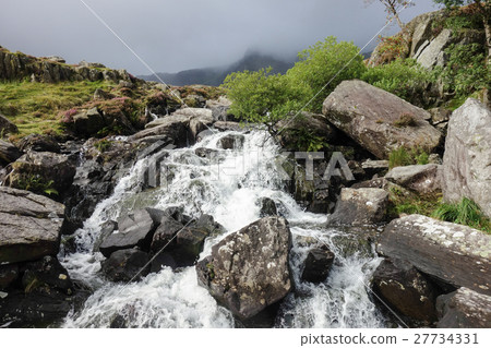 Waterfall in Snowdonia National Park in autumn 27734331
