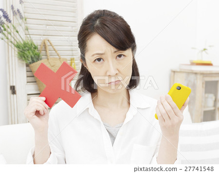 Middle female smartphone buddha mark Middle female smartphone buddha mark 27741548