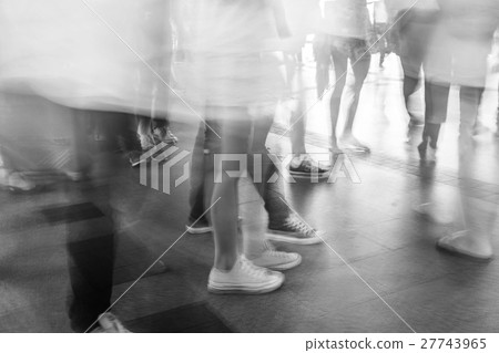 Motion blur crowded people walking Motion blur crowded people walking 27743965
