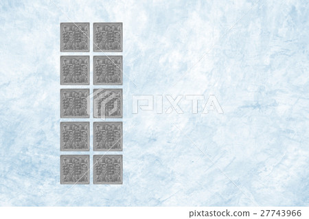 Grid of square glass block on blue concrete wall Grid of square glass block on blue concrete wall 27743966