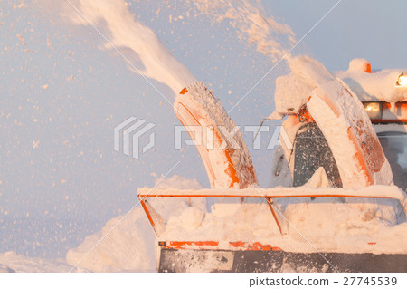 Snow truck cleaning snow from the road and streets 27745539
