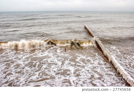 breakwater covered by ice 27745656