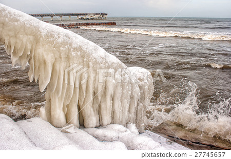 ice covered staircase on the beach 27745657