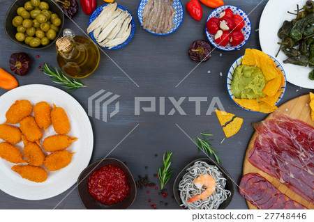 Table with spanish tapas 27748446