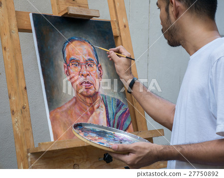 Artist painting portrait of asian man,oil color on canvas Artist painting portrait of asian man,oil color on canvas 27750892