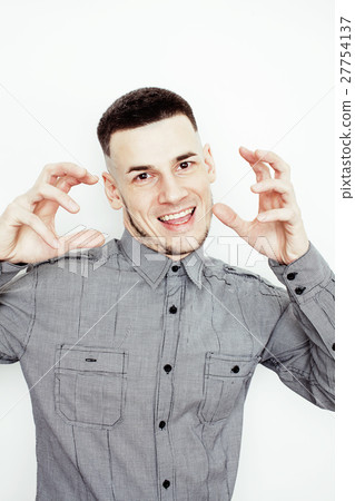 young handsome well-groomed guy posing emotional young handsome well-groomed guy posing emotional 27754137